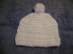 http://crystalsbabyblankets.com/pics/White crochet hat.JPG